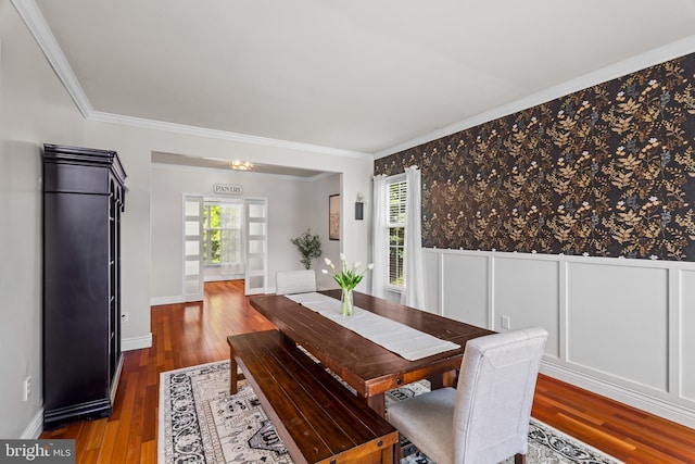 56 Thackery Ct, Sewell, NJ 08080 - dining space with crown molding, wainscoting, and wood finished floors