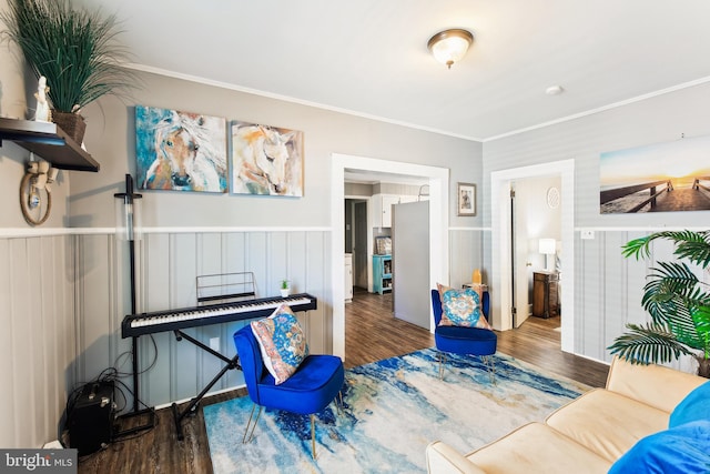 406 Myrtle St, Crisfield, MD 21817 - living area featuring ornamental molding, wainscoting, and wood finished floors