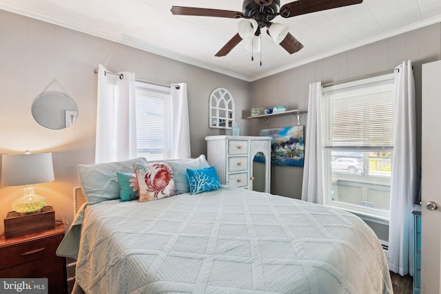 406 Myrtle St, Crisfield, MD 21817 - bedroom with crown molding, multiple windows, and a ceiling fan