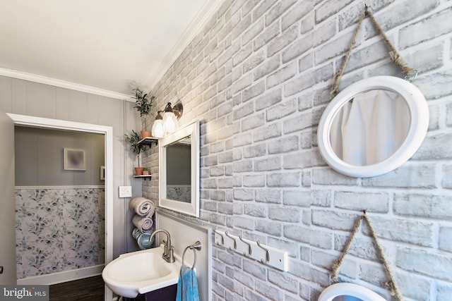 406 Myrtle St, Crisfield, MD 21817 - bathroom featuring crown molding and a sink