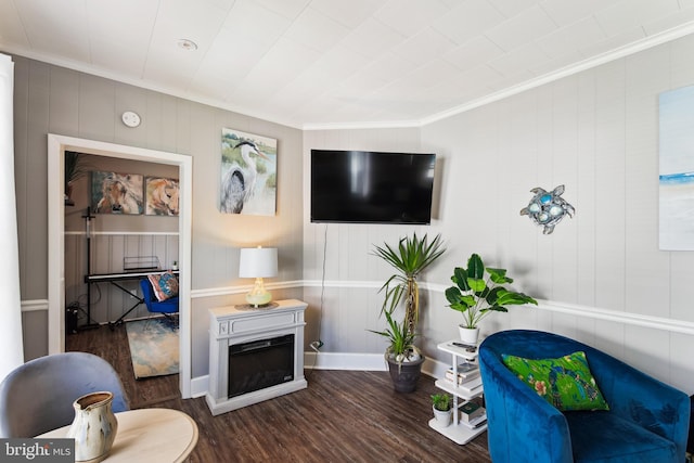 406 Myrtle St, Crisfield, MD 21817 - living area featuring ornamental molding, wood finished floors, and baseboards