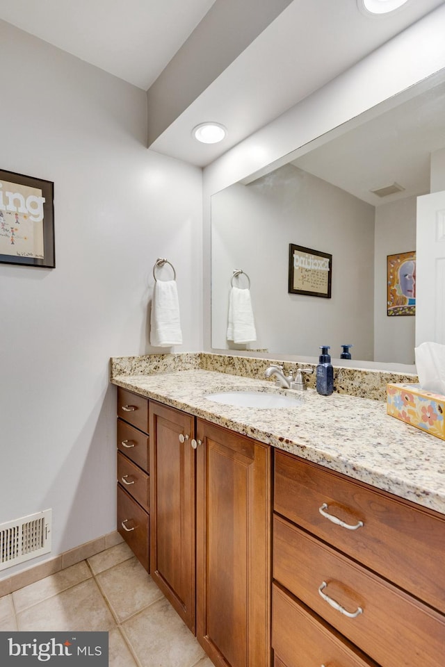 8314 Graceway Dr, Lorton, VA 22079 - bathroom with vanity, tile patterned flooring, and baseboards