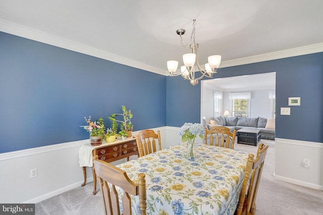 8314 Graceway Dr, Lorton, VA 22079 - dining room featuring a chandelier, light carpet, baseboards, and ornamental molding