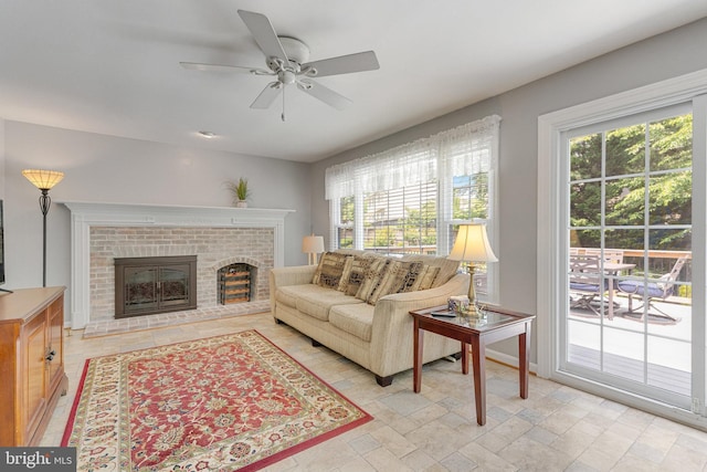 8314 Graceway Dr, Lorton, VA 22079 - living room featuring a brick fireplace and a ceiling fan