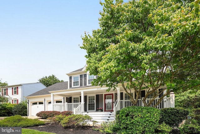 8314 Graceway Dr, Lorton, VA 22079 - obstructed view of property with a porch, a garage, and a shingled roof