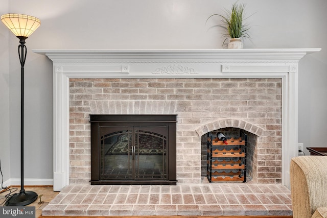 8314 Graceway Dr, Lorton, VA 22079 - detailed view of a brick fireplace and baseboards