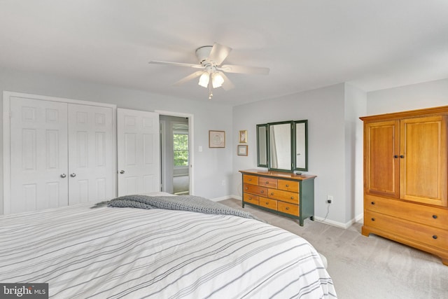 8314 Graceway Dr, Lorton, VA 22079 - bedroom featuring baseboards, light carpet, a closet, and ceiling fan