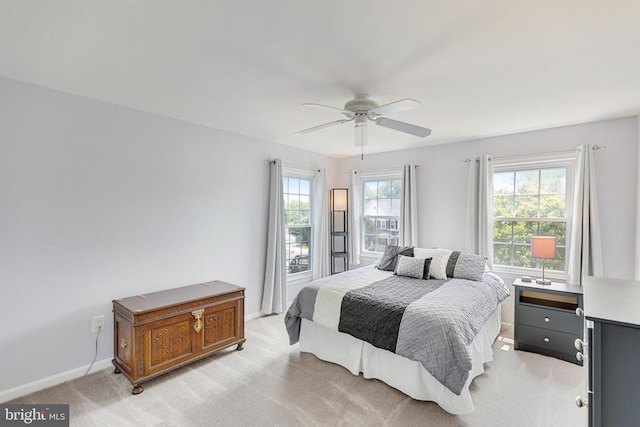 8314 Graceway Dr, Lorton, VA 22079 - bedroom with light colored carpet, baseboards, and a ceiling fan