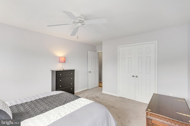 8314 Graceway Dr, Lorton, VA 22079 - bedroom with light colored carpet, a closet, baseboards, and ceiling fan