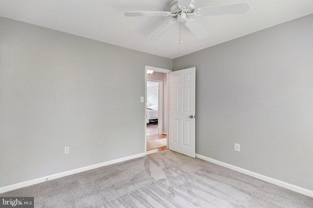 8314 Graceway Dr, Lorton, VA 22079 - carpeted empty room featuring baseboards and a ceiling fan