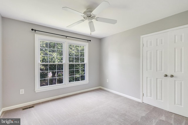 8314 Graceway Dr, Lorton, VA 22079 - unfurnished bedroom with carpet floors, baseboards, and a closet