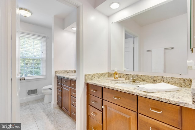 8314 Graceway Dr, Lorton, VA 22079 - bathroom with toilet, vanity, tile patterned floors, and baseboards