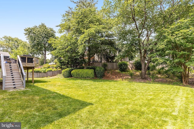 8314 Graceway Dr, Lorton, VA 22079 - view of yard with stairs and a wooden deck