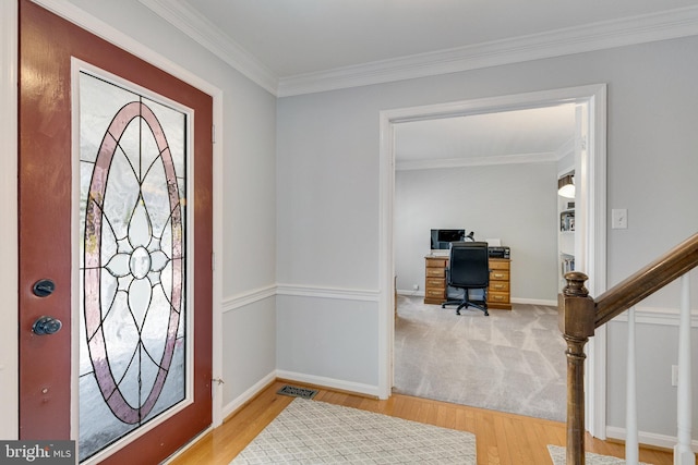8314 Graceway Dr, Lorton, VA 22079 - foyer entrance with wood finished floors, crown molding, and baseboards