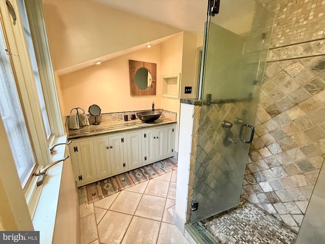 615 Westbourne Rd, West Chester, PA 19382 - bathroom with lofted ceiling, vanity, and a shower stall