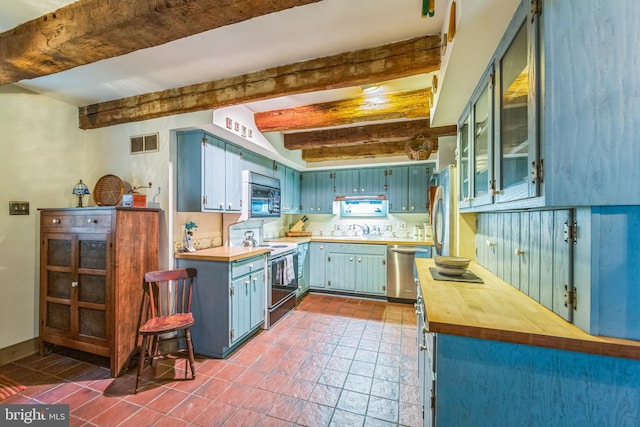 615 Westbourne Rd, West Chester, PA 19382 - kitchen featuring stainless steel appliances, a sink, beamed ceiling, butcher block counters, and blue cabinets
