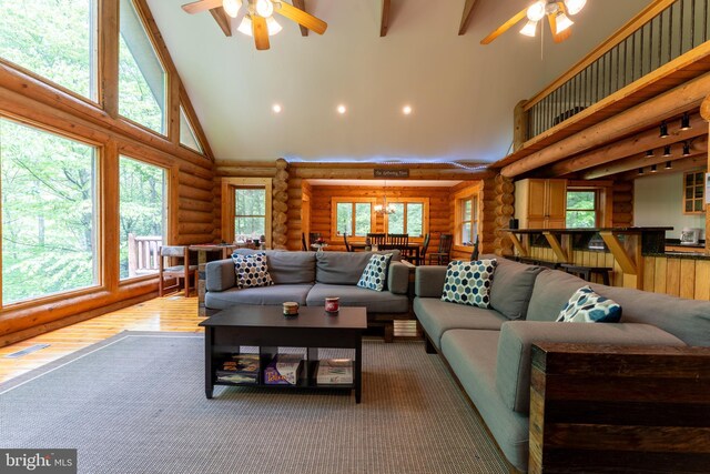 969 Hoyes Run Rd, Oakland, MD 21550 - living room with high vaulted ceiling, rustic walls, ceiling fan, wood finished floors, and recessed lighting