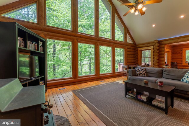 969 Hoyes Run Rd, Oakland, MD 21550 - living area featuring log walls, high vaulted ceiling, a ceiling fan, light wood finished floors, and recessed lighting