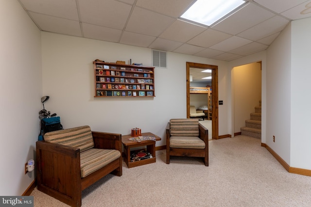 969 Hoyes Run Rd, Oakland, MD 21550 - living area featuring a paneled ceiling, carpet, stairs, and baseboards