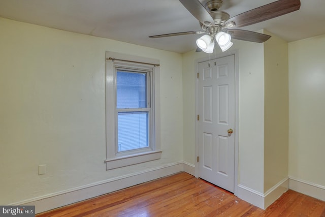 12 W Mispillion St, Harrington, DE 19952 - spare room featuring light wood finished floors, baseboards, and a ceiling fan