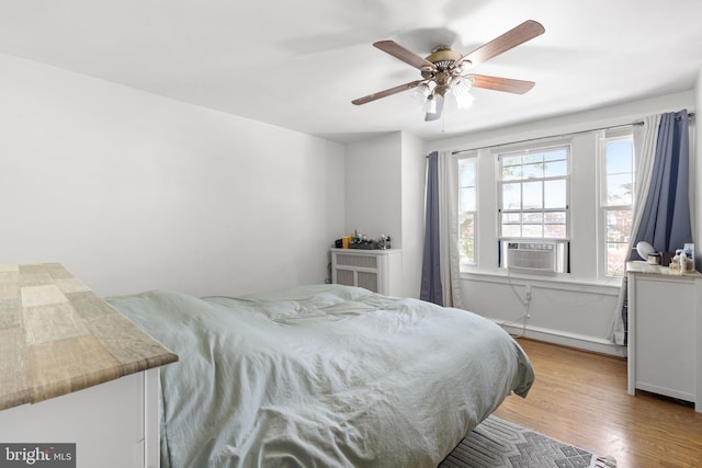 1614 Pine St, Norristown, PA 19401 - bedroom featuring light wood-type flooring, cooling unit, and a ceiling fan