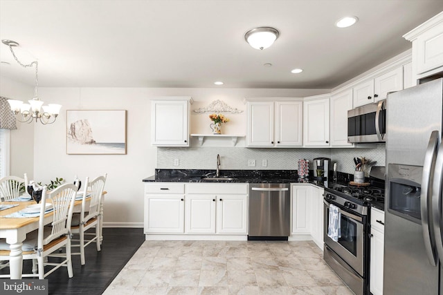 2033 Rte 35 N Unit B- N, Seaside Heights, NJ 08751 - kitchen with stainless steel appliances, a sink, a chandelier, open shelves, and white cabinetry