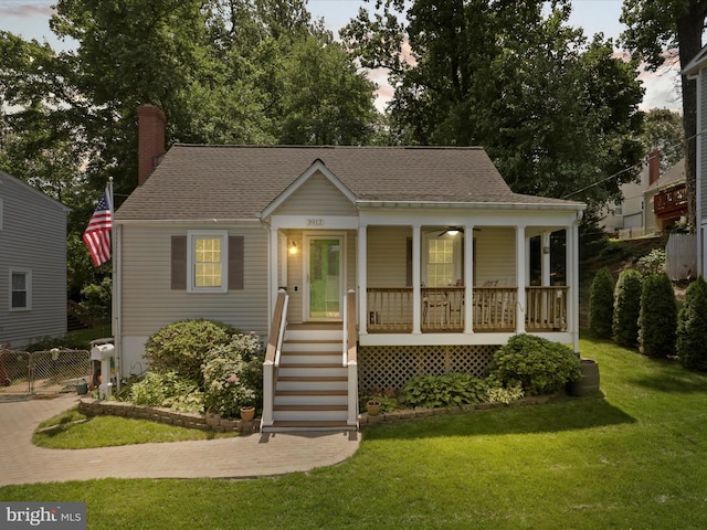 3912 13th St S, Arlington, VA 22204 - bungalow-style house featuring a porch, a chimney, a shingled roof, and stairs