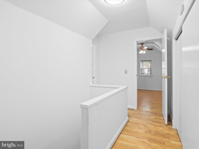 3912 13th St S, Arlington, VA 22204 - hall featuring light wood-type flooring, lofted ceiling, an upstairs landing, and baseboards