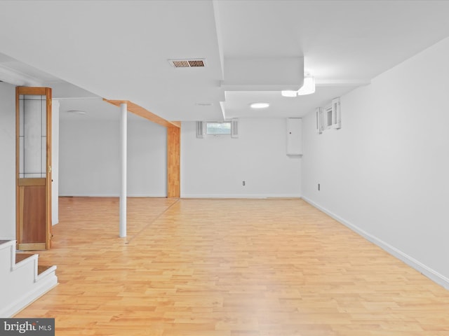 3912 13th St S, Arlington, VA 22204 - below grade area featuring light wood finished floors, baseboards, and stairs