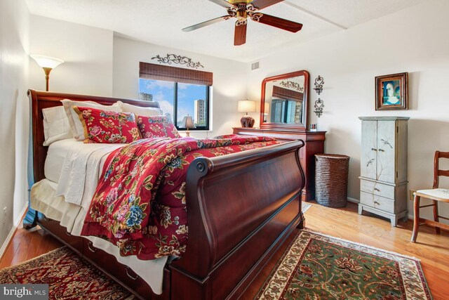 5904 Mount Eagle Dr Unit 1105, Alexandria, VA 22303 - bedroom with wood finished floors, baseboards, and ceiling fan