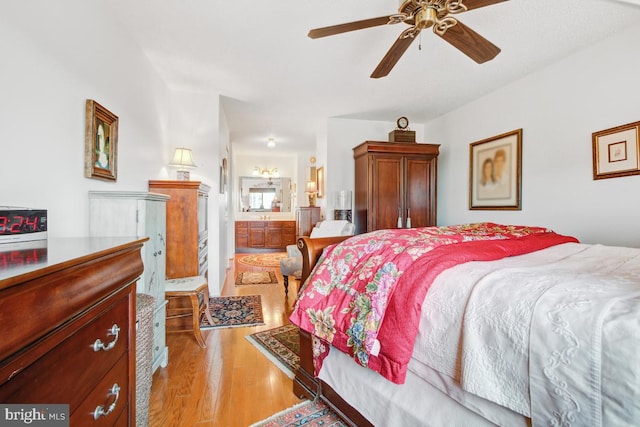5904 Mount Eagle Dr Unit 1105, Alexandria, VA 22303 - bedroom with light wood-style flooring, connected bathroom, and ceiling fan