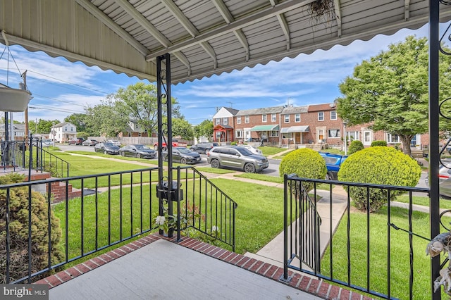 1210 Delbert Ave, Baltimore, MD 21222 - porch with a residential view and a yard