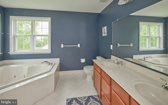 2056 Derbyshire Rd, Furlong, PA 18925 - full bath featuring tile patterned floors, double vanity, a whirlpool tub, and healthy amount of natural light