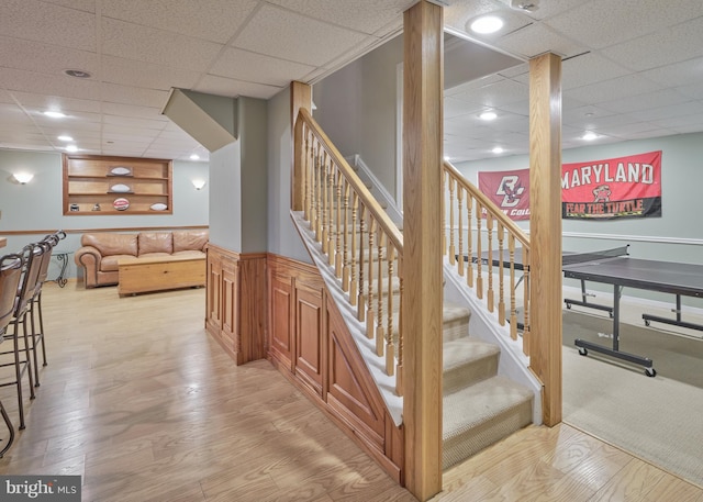 2056 Derbyshire Rd, Furlong, PA 18925 - stairway featuring a paneled ceiling, wainscoting, and wood finished floors