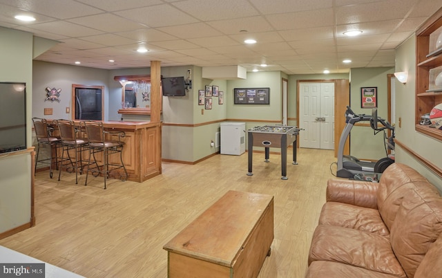 2056 Derbyshire Rd, Furlong, PA 18925 - playroom featuring light wood-style floors, a drop ceiling, baseboards, and a bar