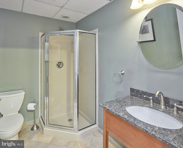 2056 Derbyshire Rd, Furlong, PA 18925 - full bathroom with toilet, vanity, a shower stall, baseboards, and a paneled ceiling