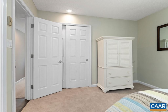 2070 Stone Rdg, Condos, Wintergreen, VA 22967 - bedroom featuring light colored carpet, a closet, and baseboards