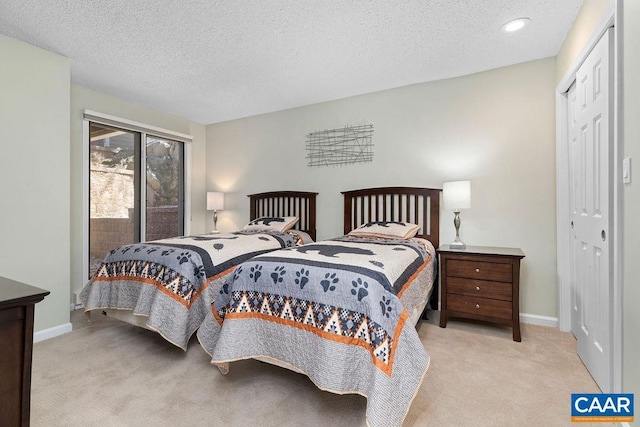 2070 Stone Rdg, Condos, Wintergreen, VA 22967 - carpeted bedroom with baseboards, a textured ceiling, a closet, and recessed lighting