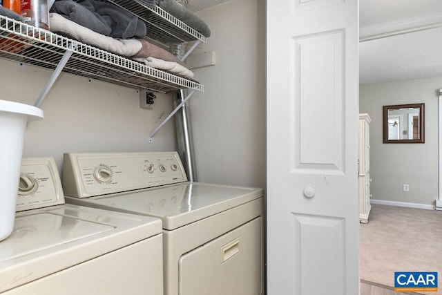 2070 Stone Rdg, Condos, Wintergreen, VA 22967 - laundry area with independent washer and dryer, light colored carpet, and baseboards