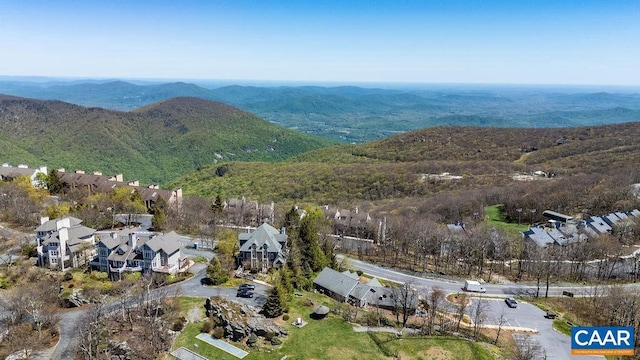 2070 Stone Rdg, Condos, Wintergreen, VA 22967 - aerial overview of property's location featuring nearby suburban area and a mountain backdrop