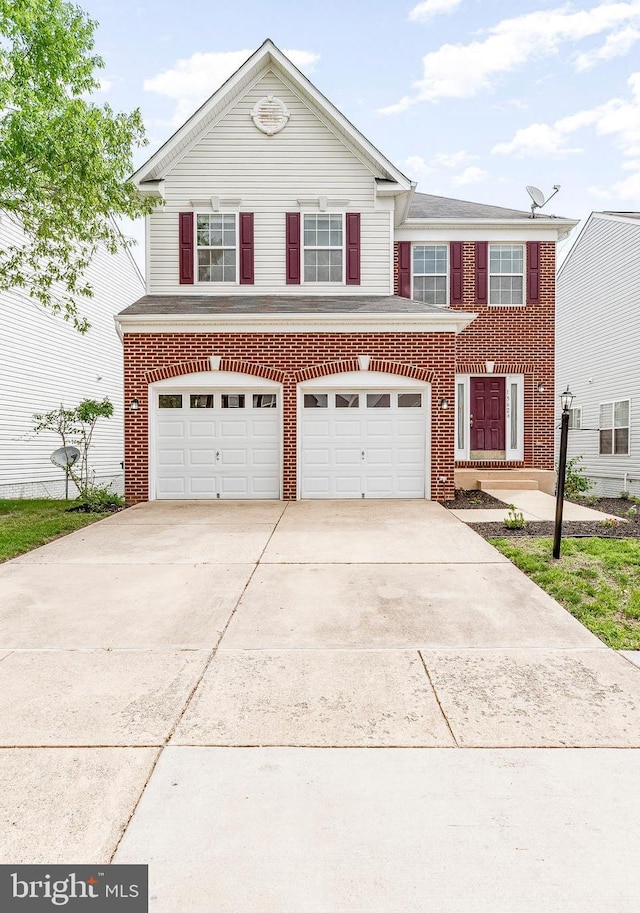 15626 Chadsey Ln, Brandywine, MD 20613 - view of front of house featuring an attached garage, brick siding, and concrete driveway