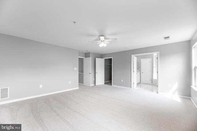 15626 Chadsey Ln, Brandywine, MD 20613 - unfurnished bedroom featuring baseboards, light colored carpet, a walk in closet, and connected bathroom