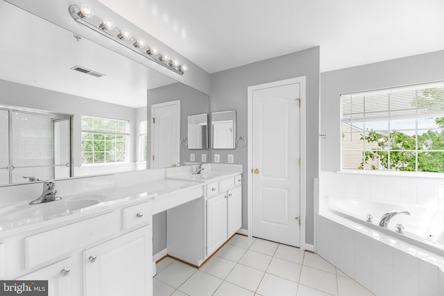 15626 Chadsey Ln, Brandywine, MD 20613 - bathroom featuring a garden tub, tile patterned flooring, double vanity, and a stall shower
