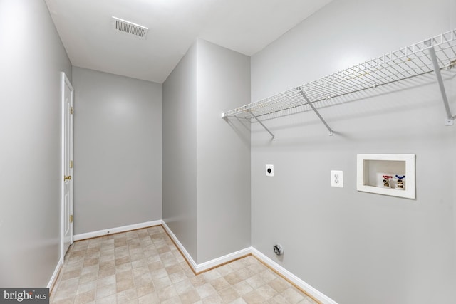 15626 Chadsey Ln, Brandywine, MD 20613 - washroom featuring hookup for a washing machine, electric dryer hookup, baseboards, and stone finish flooring