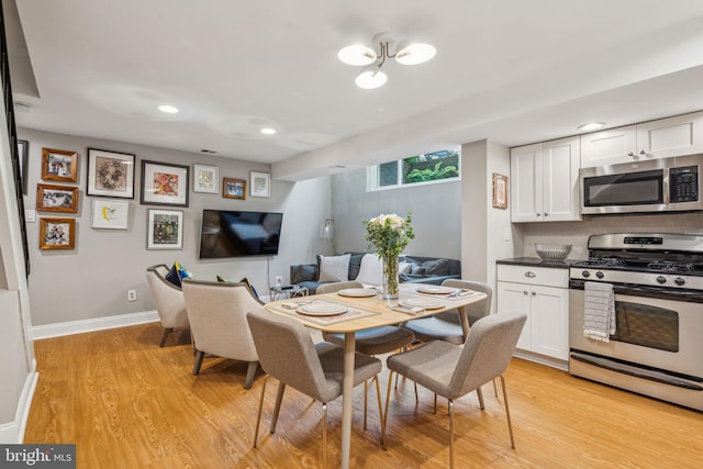403 S Alder St, Philadelphia, PA 19147 - dining space featuring light wood finished floors, baseboards, and recessed lighting