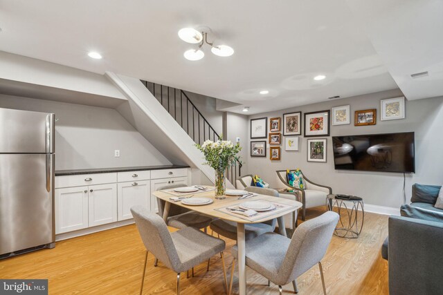 403 S Alder St, Philadelphia, PA 19147 - dining room featuring stairs, light wood-style flooring, recessed lighting, and baseboards