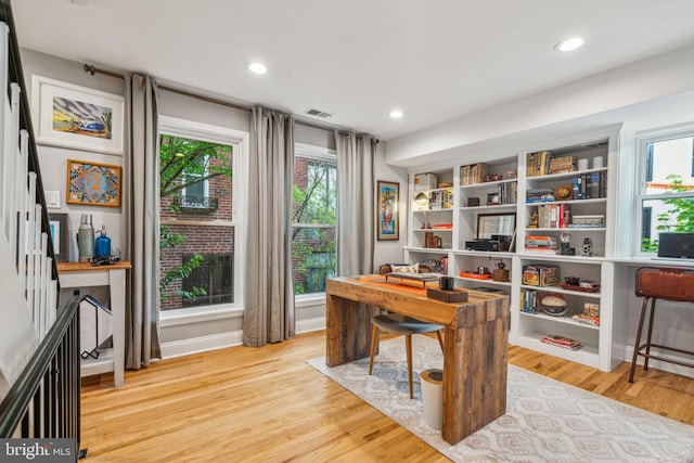 403 S Alder St, Philadelphia, PA 19147 - home office with light wood-style floors and recessed lighting