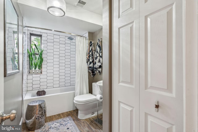 403 S Alder St, Philadelphia, PA 19147 - full bath with toilet, shower / tub combo, and wood finished floors