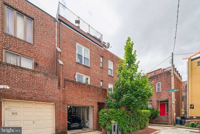 403 S Alder St, Philadelphia, PA 19147 - view of building exterior with a garage