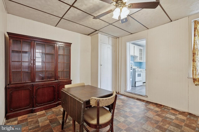 dining area with a ceiling fan